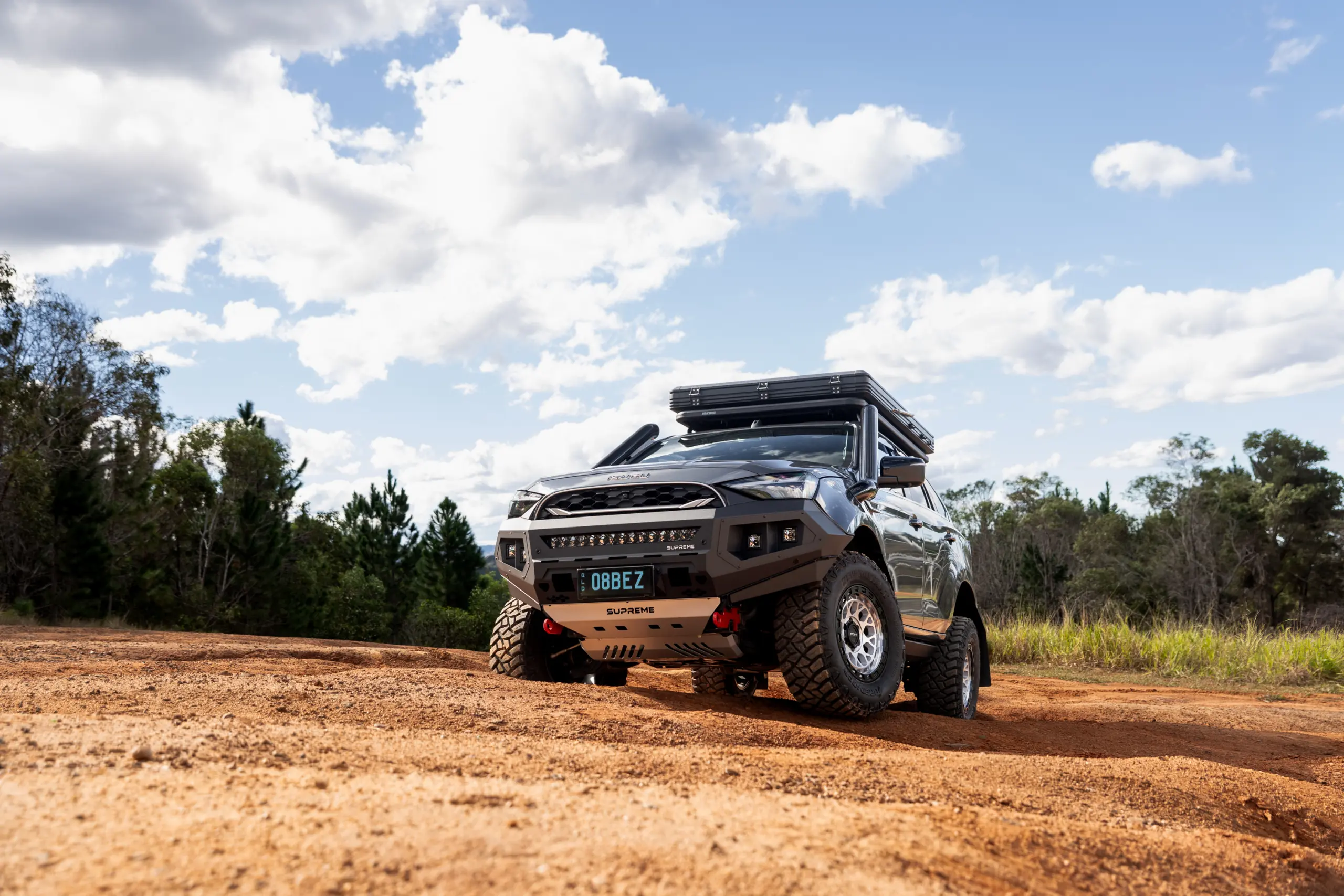 Grey Isuzu MU-X with ROH Atlas 4x4 Wheel in Machined Centre Black Lip finish off road
