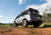 Grey Isuzu MU-X with ROH Atlas 4x4 Wheel in Machined Centre Black Lip finish off road