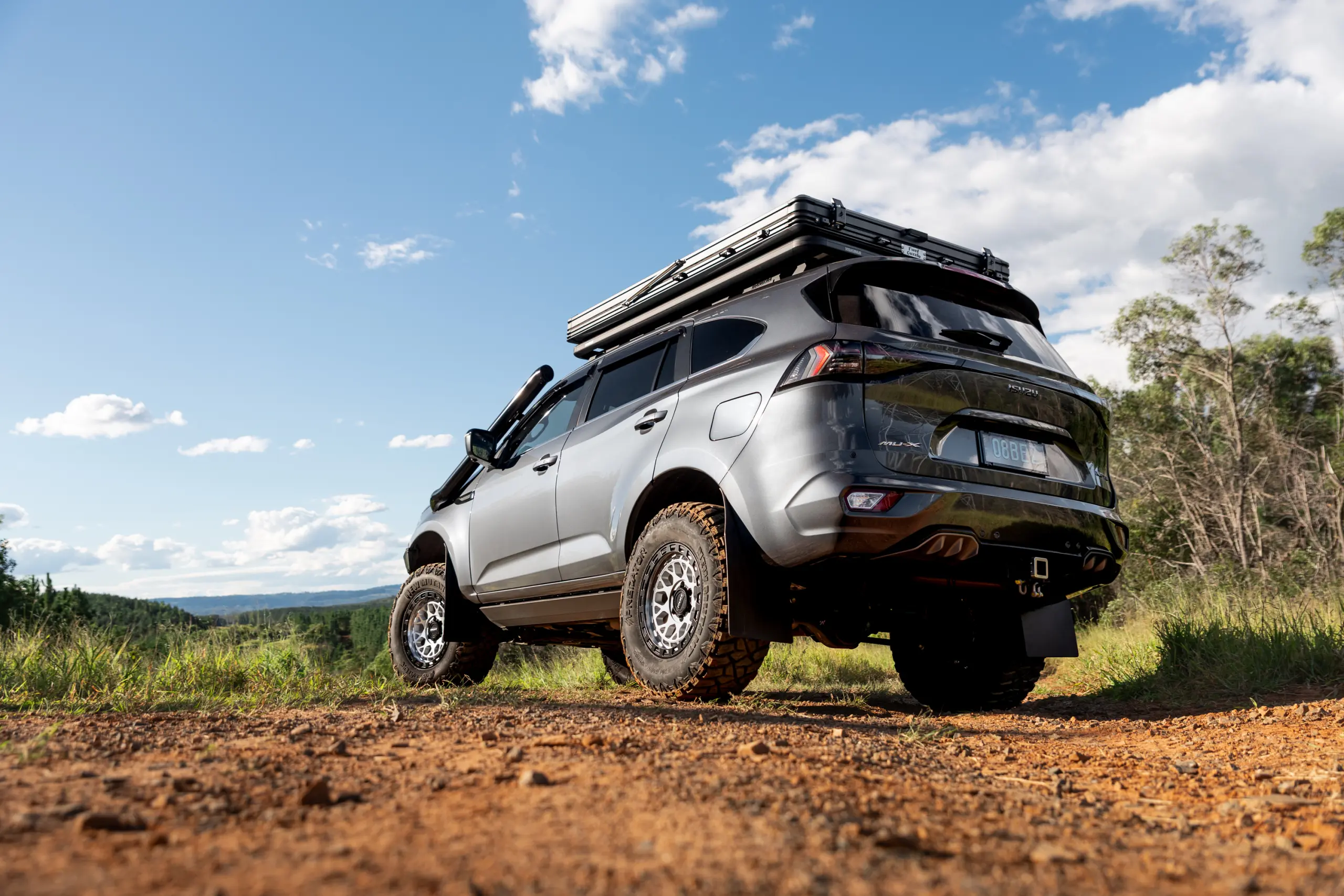 Grey Isuzu MU-X with ROH Atlas 4x4 Wheel in Machined Centre Black Lip finish off road