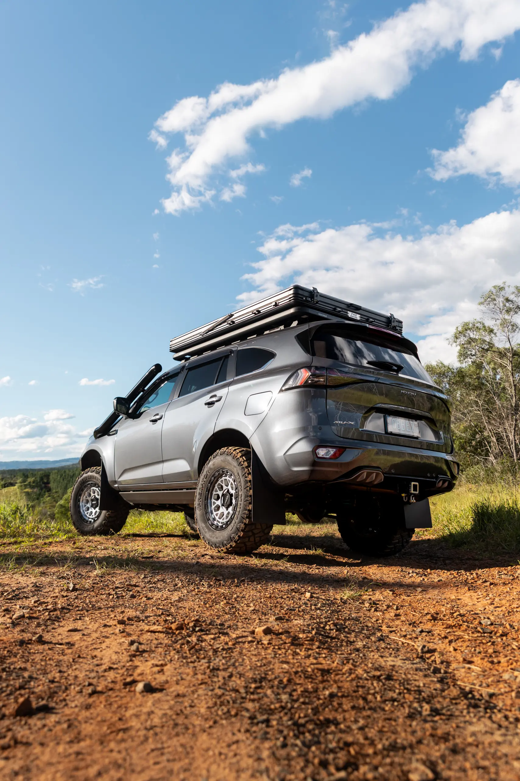 Grey Isuzu MU-X with ROH Atlas 4x4 Wheel in Machined Centre Black Lip finish off road