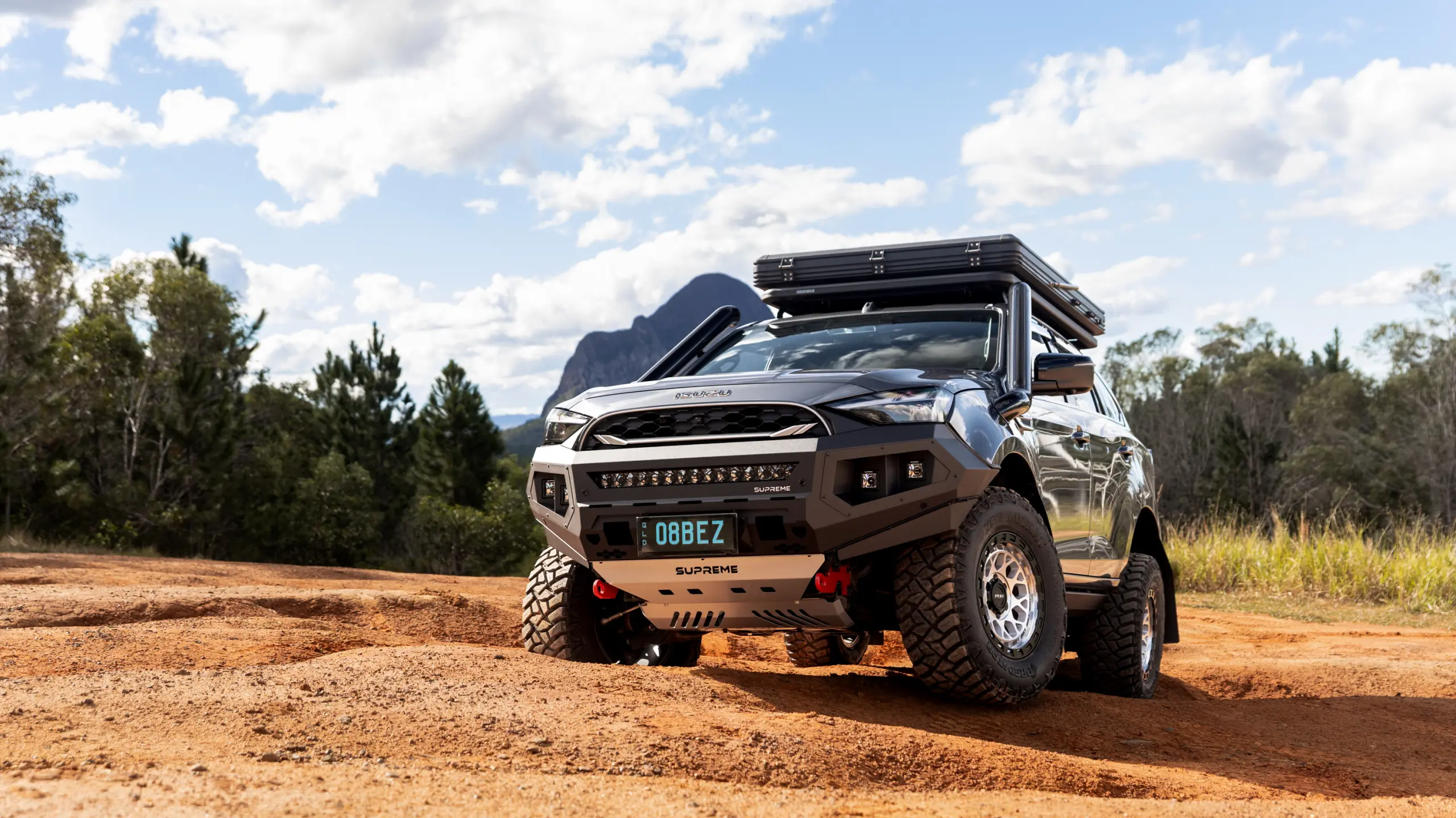 Grey Isuzu MU-X with ROH Atlas 4x4 Wheel in Machined Centre Black Lip finish off road