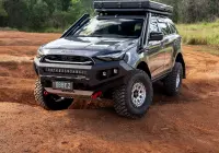 Grey Isuzu MU-X with ROH Atlas 4x4 Wheel in Machined Centre Black Lip finish off road