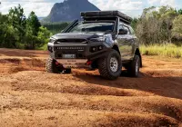 Grey Isuzu MU-X with ROH Atlas 4x4 Wheel in Machined Centre Black Lip finish off road