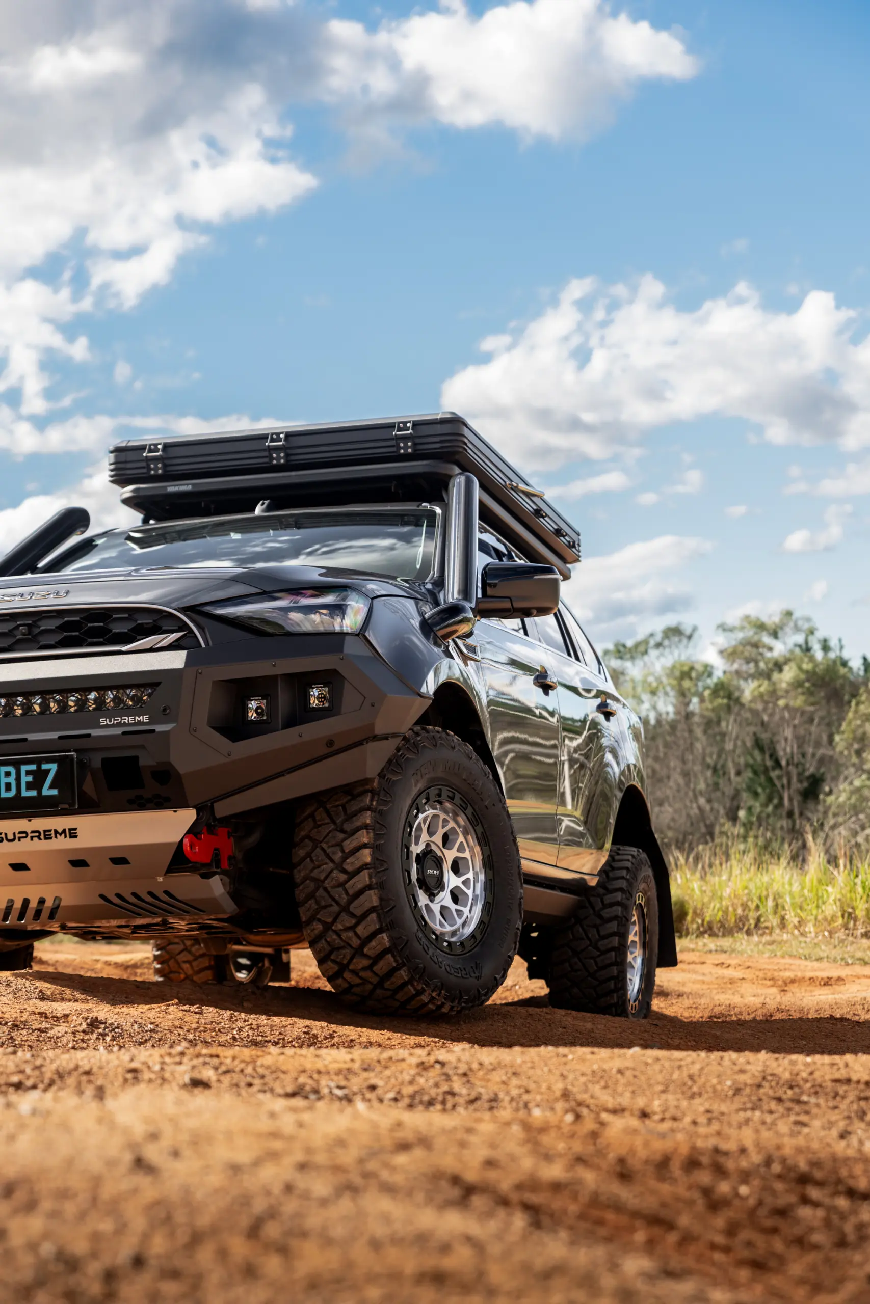 Grey Isuzu MU-X with ROH Atlas 4x4 Wheel in Machined Centre Black Lip finish off road