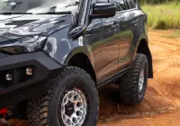 Grey Isuzu MU-X with ROH Atlas 4x4 Wheel in Machined Centre Black Lip finish off road