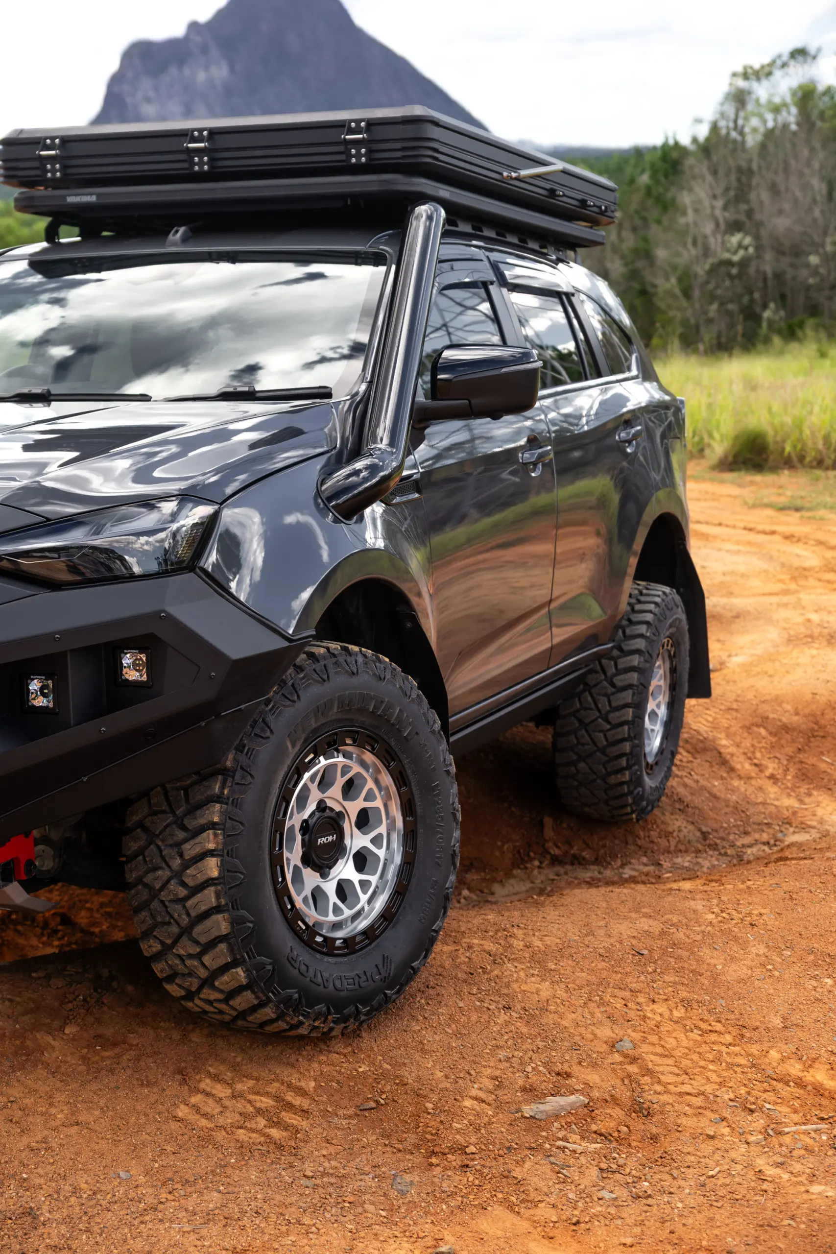 Grey Isuzu MU-X with ROH Atlas 4x4 Wheel in Machined Centre Black Lip finish off road