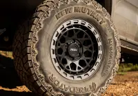 Silver Ford Ranger Next-Gen with 17x9 +12 ROH Atlas 4x4 Wheel in Black Centre Graphite Lip finish in forest