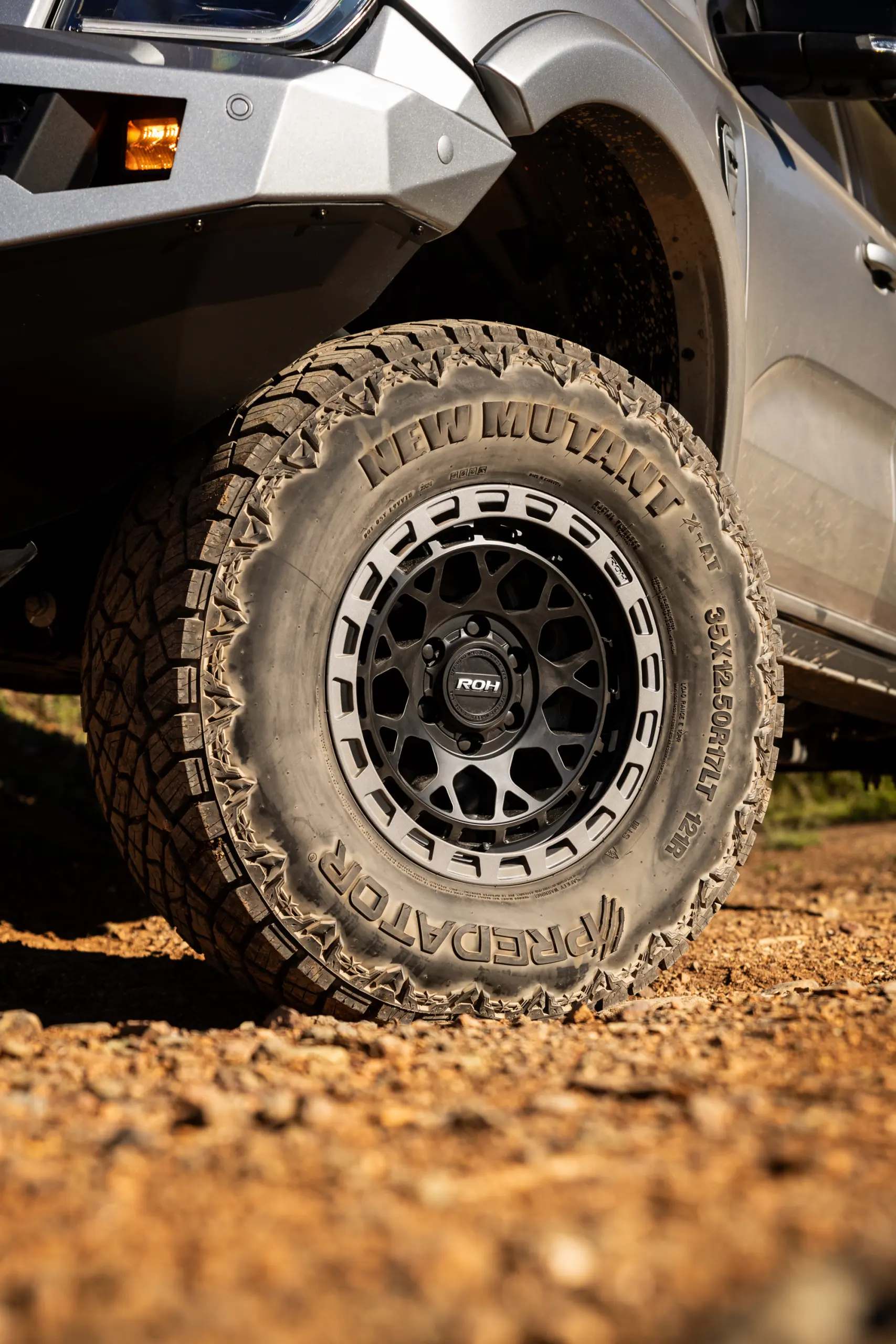 Silver Ford Ranger Next-Gen with 17x9 +12 ROH Atlas 4x4 Wheel in Black Centre Graphite Lip finish in forest