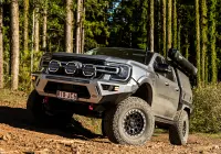 Silver Ford Ranger Next-Gen with 17x9 +12 ROH Atlas 4x4 Wheel in Black Centre Graphite Lip finish in forest