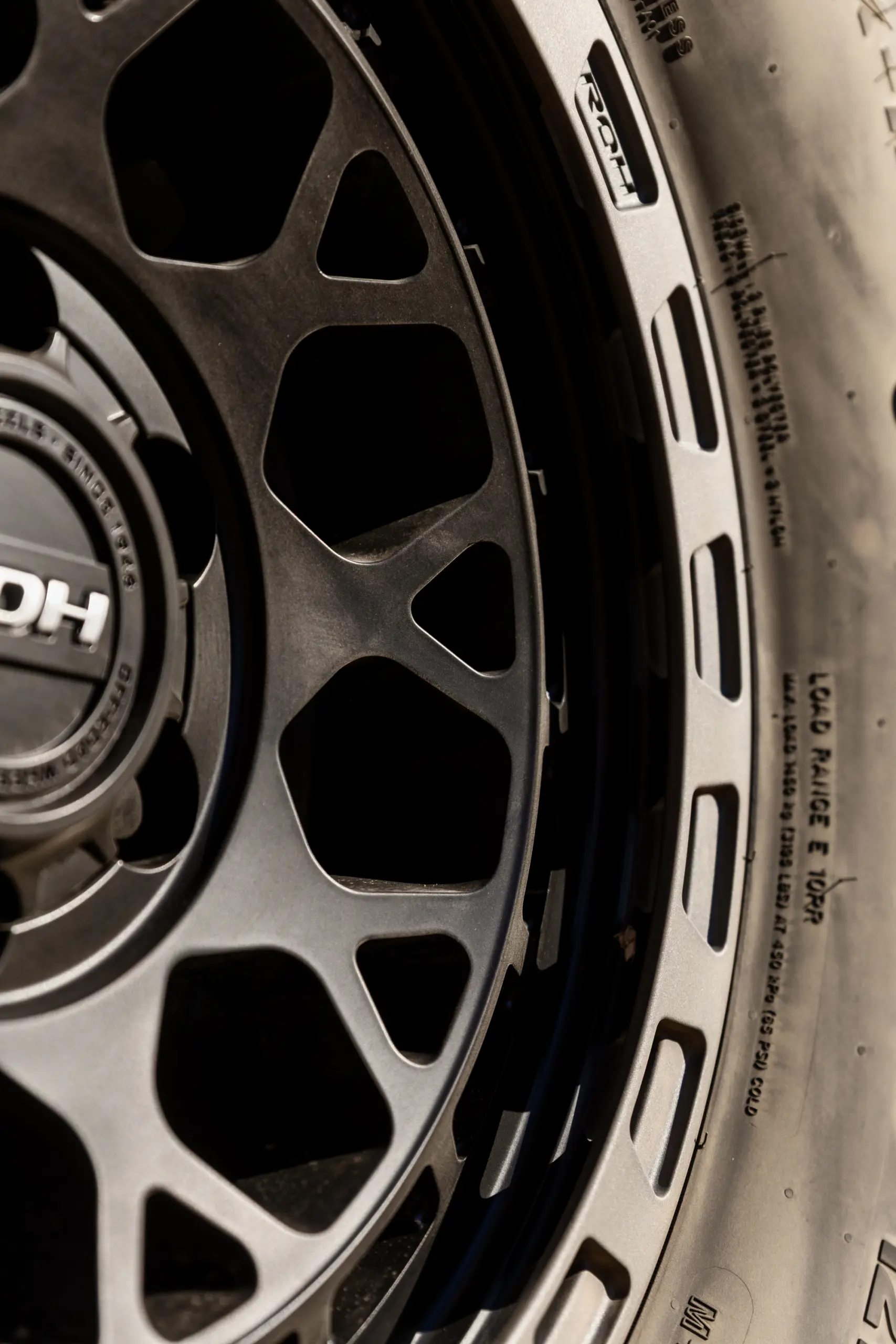 Close-up of spokes on 17x9 +12 ROH Atlas 4x4 Wheel in Black Centre Graphite Lip finish