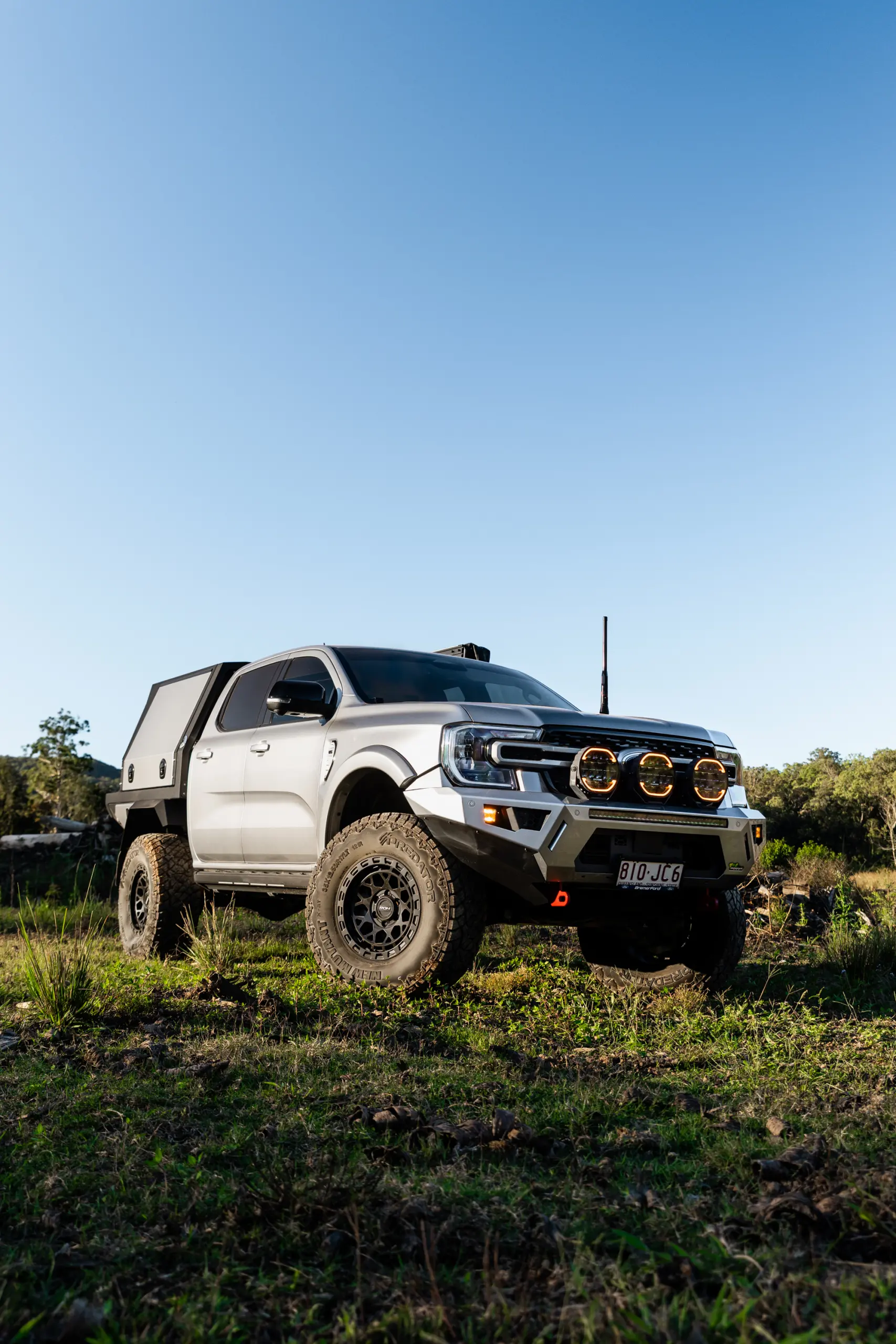 Silver Ford Ranger Next-Gen with 17x9 +12 ROH Atlas 4x4 Wheel in Matte Black in forest