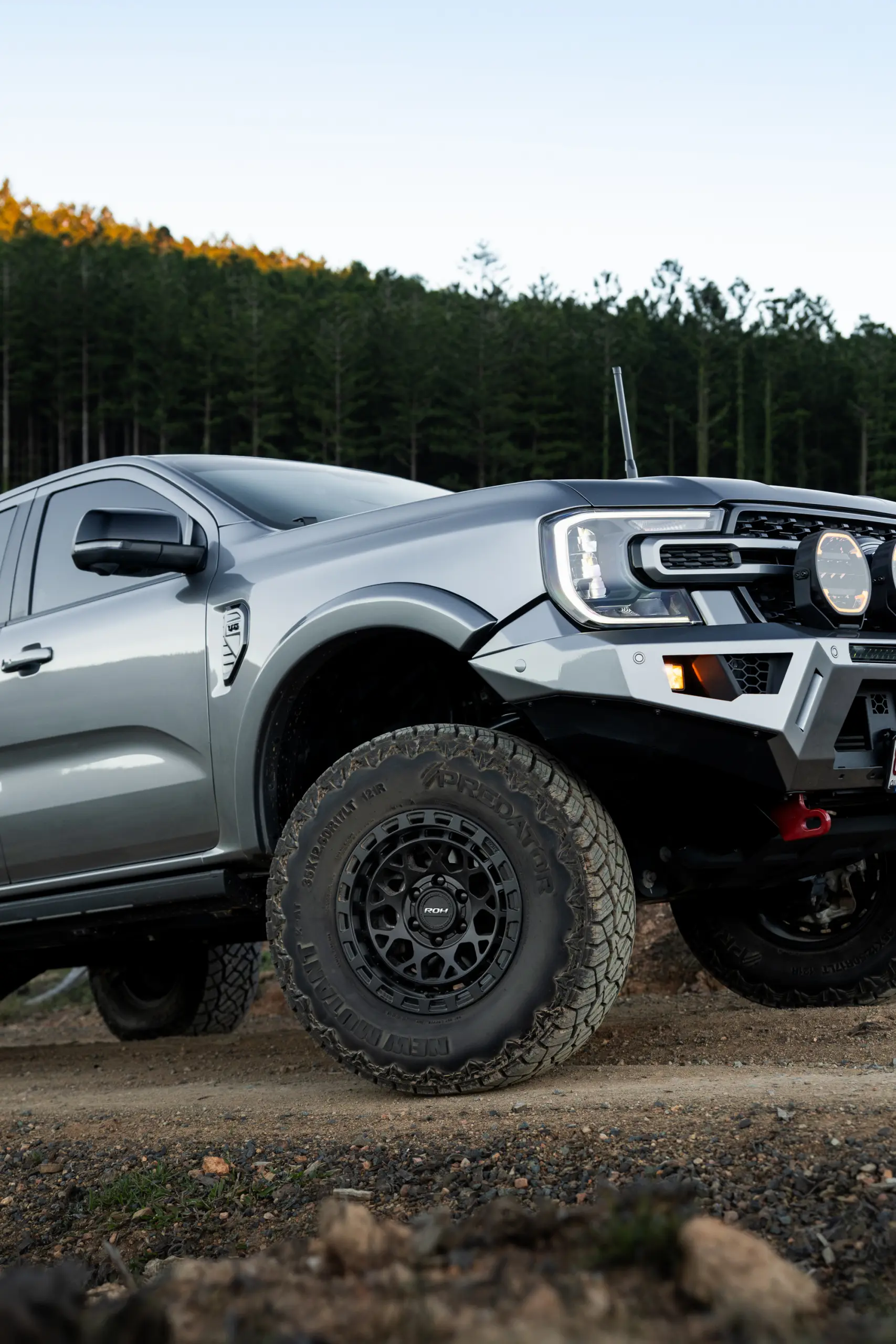 Silver Ford Ranger Next-Gen with 17x9 +12 ROH Atlas 4x4 Wheel in Matte Black in forest