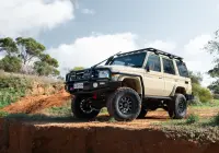 Toyota LandCruiser 76 Series with Graphite Centre Black Lip Raid 5 4x4 Wheel off road