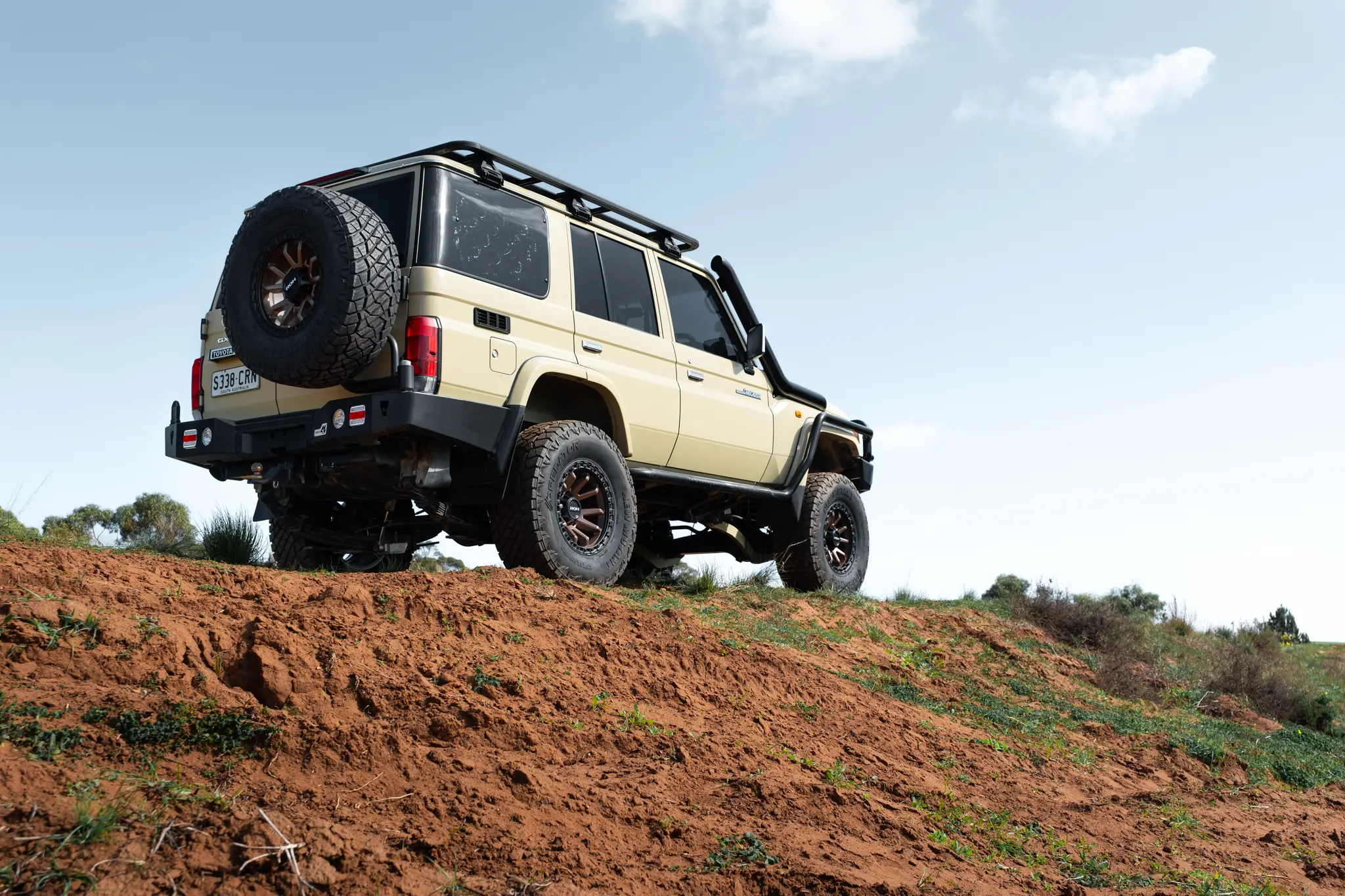 Toyota LandCruiser 76 Series Landcruiser with Bronze Centre Black Lip Raid 5 4x4 Wheel off road