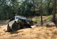White Nissan GQ Patrol Wagon with ROH HYBRIDLOCK Zullo 17x9 -22 Matte Black 4x4 Wheel off road