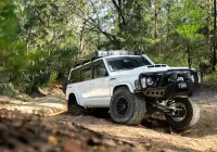 White Nissan GQ Patrol Wagon with ROH HYBRIDLOCK Zullo 17x9 -22 Matte Black 4x4 Wheel off road