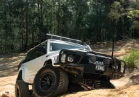White Nissan GQ Patrol Wagon with ROH HYBRIDLOCK Zullo 17x9 -22 Matte Black 4x4 Wheel off road