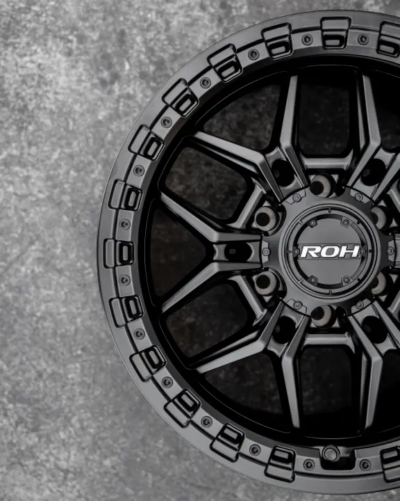 ROH Axe Matte Black 4x4 Alloy Wheel on concrete floor