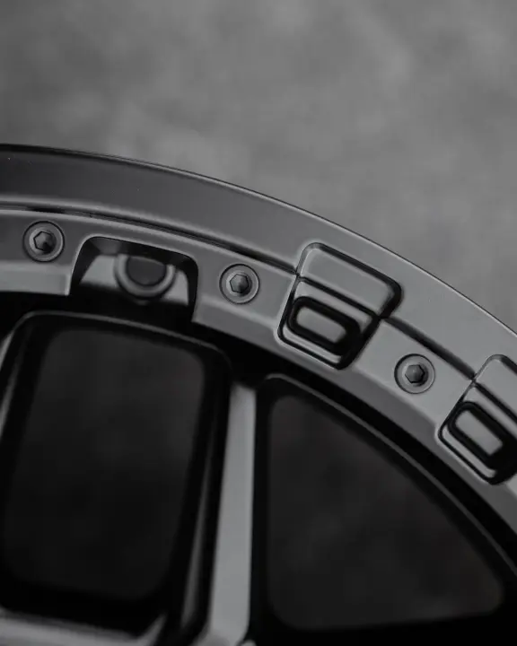 Close Up of ROH Axe Matte Black 4x4 Alloy Wheel on concrete floor