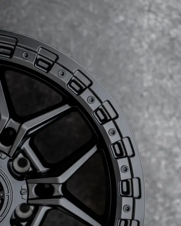Close Up of ROH Axe Matte Black 4x4 Alloy Wheel on concrete floor