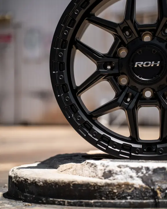 ROH Axe Matte Black 4x4 Alloy Wheel on concrete