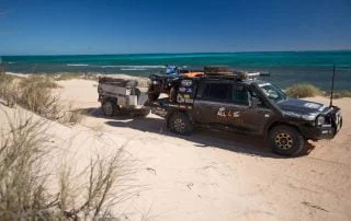 All 4 Adventure Isuzu DMax with Octagon pulling car trailer