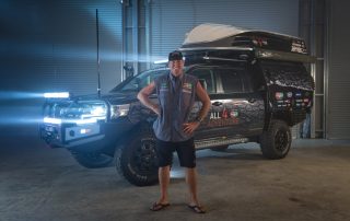 Jase from All 4 Adventure standing in front of LC200 with Octagon wheels