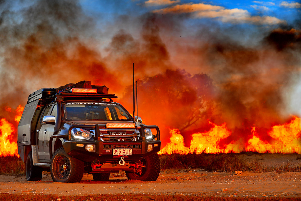 Steel wheels 4WD Touring DMAX bushfire background