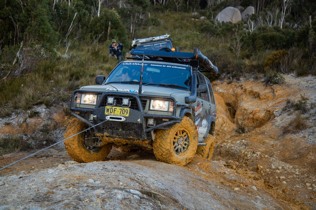 Muddy 4WD wheels on Offroad Adventure Show Jackaroo being winched