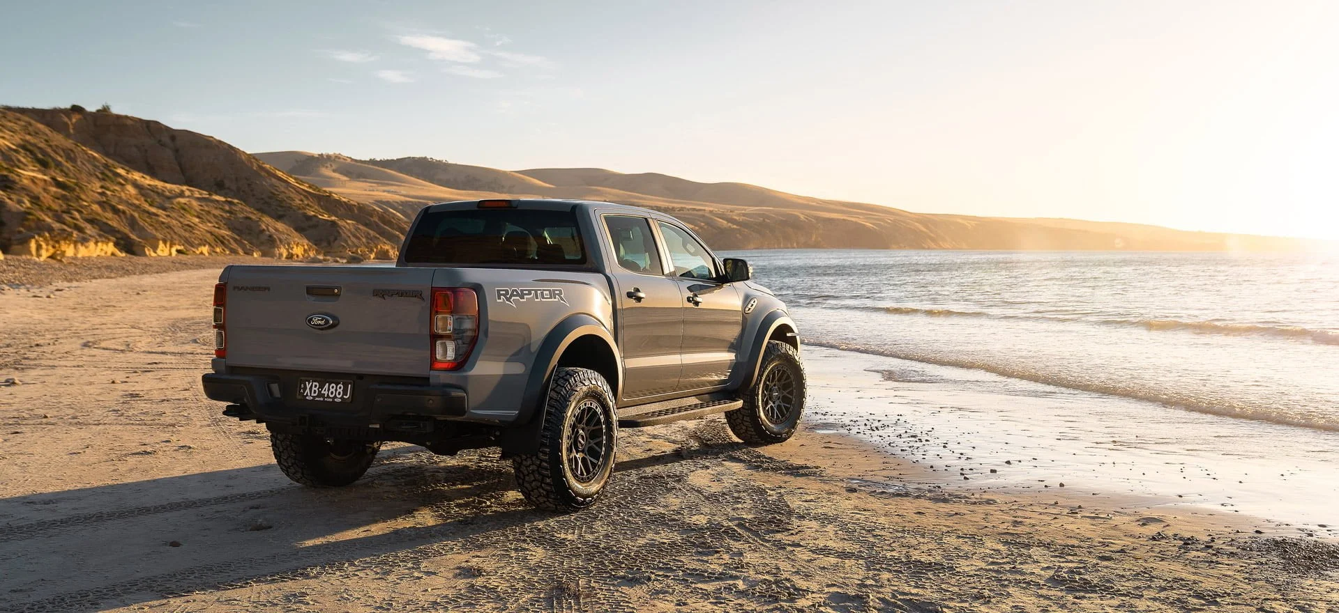 Crawler wheel on Ford Ranger Raptor feature beach sunset slide. Ford Ranger Wheels.