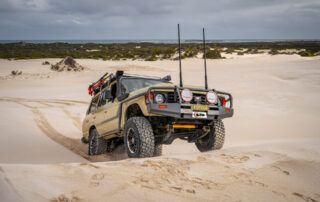 ROH Vapour wheels on Sandy 60 Series LandCruiser driving up sand dunes