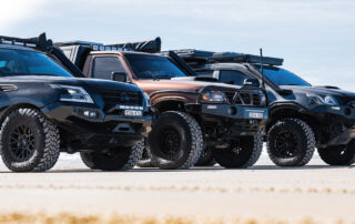 Red Dirt Diary vehicles with ROH Wheels on beach