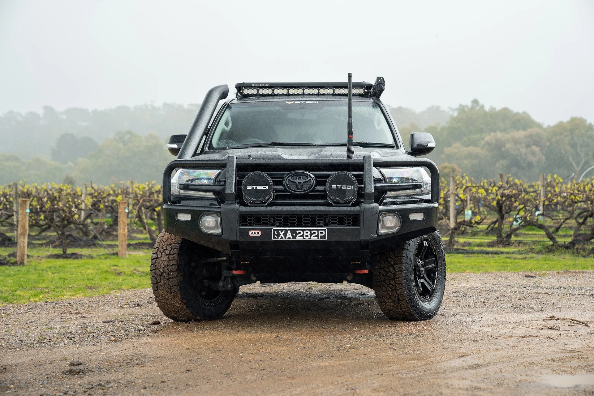 Rock wheel black LC200 front view at vineyeard