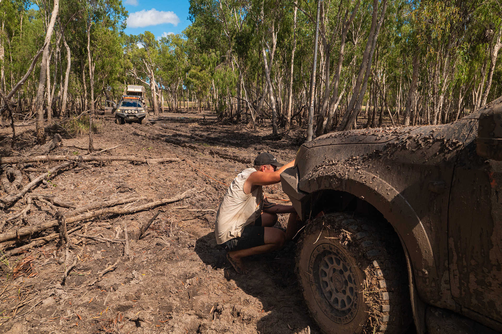 All 4 Adventure LC200 and D-Max on Assault wheels bogged in muddy track
